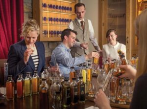Scotch Whisky Training School - people nosing drams and blending their own whisky