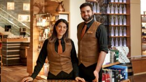 staff at aroma wheel in the whisky shop