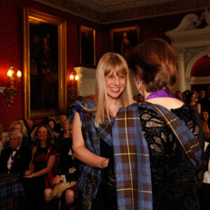 Julie Trevisan Hunter being presented with a quaich