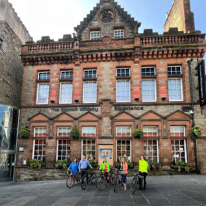 Members of The Scotch Whisky Experience bike to work