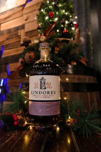 Bottle of Lindores Abbey Sherry Butts in festive scene