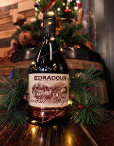 Bottle of Edradour Cream in festive scene