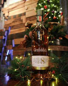 Bottle of Glenfiddich 18yo in festive scene