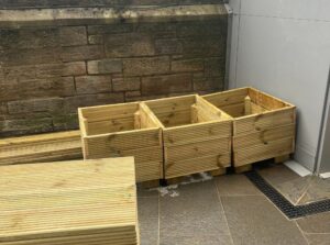 The first planters placed in the playground