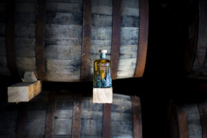 Nc'nean whisky bottle with casks