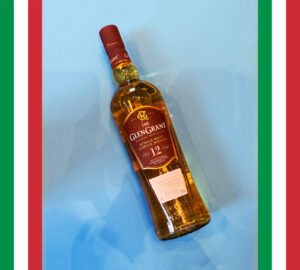 Bottle of Glen Grant 12 on a blue background with a border of Italian flags.