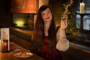 Real Mary King's Close actor in Amber Restaurant with a dram of whisky.