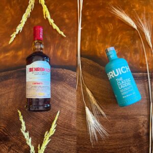 Two images included. On the righ tis an image of Bruichladdich The Classic Laddie Scotch whisyk on an Amber wooden table with barley. On the left is a bottle of Benromach Organic Scotch whisky on an amber wooden table with barley.